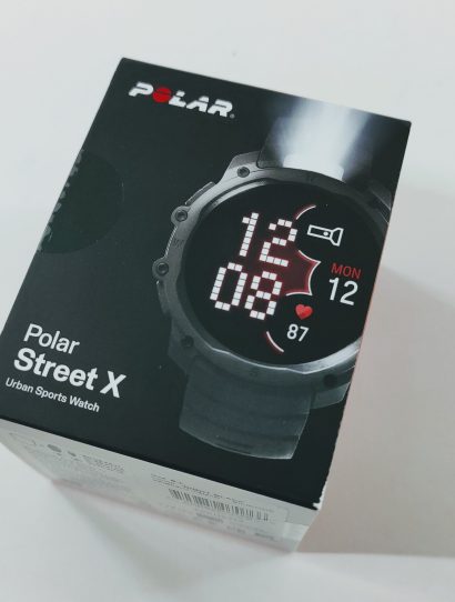 Box for Polar Street X urban sports watch, angled on a white surface with a large watch image on the front.