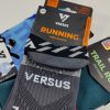 Packaging for Versus Running socks: ankle-length, Pro Range, assorted colors, tags visible on each package