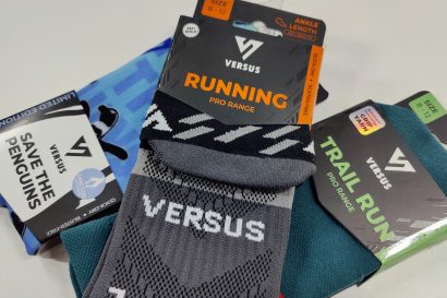 Packaging for Versus Running socks: ankle-length, Pro Range, assorted colors, tags visible on each package